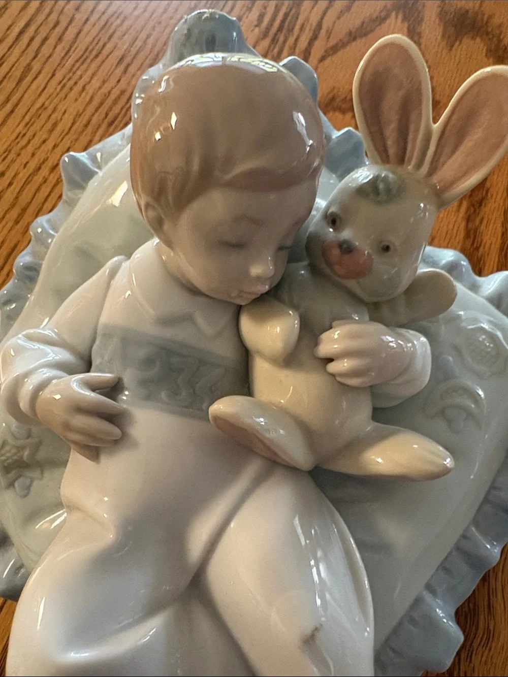 Porcelain Boy Figurine on Blue Pillow with Bunny - Light Blue and Cream